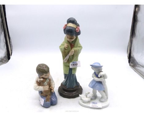 A Lladro figure of an oriental lady with fan (parasol missing), Nao figure of a boy cuddling a puppy and a Bavarian figure of