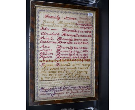 A framed and glazed sampler by Tegwyn Howells; a rare Welsh sampler of her families names and birth dates, 1820 to 1869, Cadl