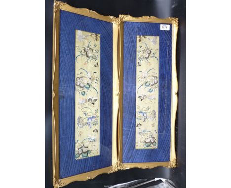 A pair of framed and mounted vintage Chinese embroidered panels, 23" x 8 1/2" framed.