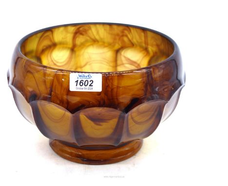 A heavy vintage Davidson footed glass bowl in amber with brown and claret random swirls and having minute signs of age, 6" ta