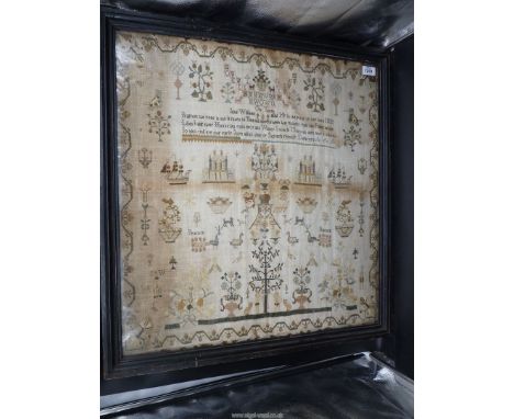 A rare sampler by Jane Williams, aged 14, 1811, showing peacocks, sailing ships, verses, family initials, pair of Georgian ho