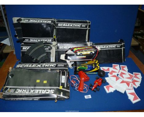 A large quantity of Scalextric, some boxed, including Perobras No. 3, Audi Quatro and Ferrari F1/87 cars, track controller et