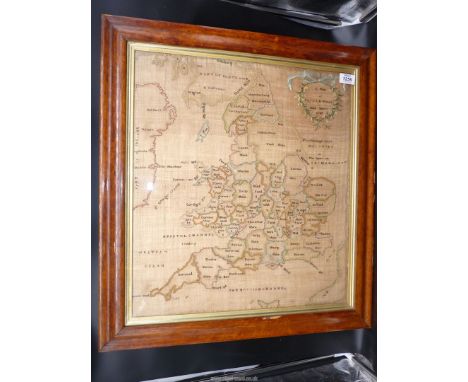 A Map of England and Wales sampler by Jane Barry, 1787, with a finely sewn floral wreath around the title, 23 1/2'' x 25 1/2'