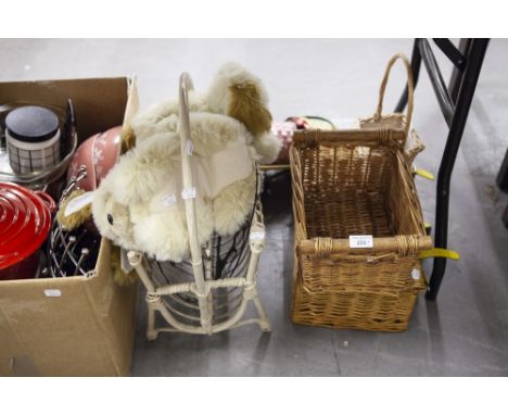FIVE WICKER HANGING BASKETS, A PAIR OF BLACK METAL CIRCULAR SILHOUETTE WALL ORNAMENTS, A WICKER HAMPER BASKET, A PAIR OF SOFT