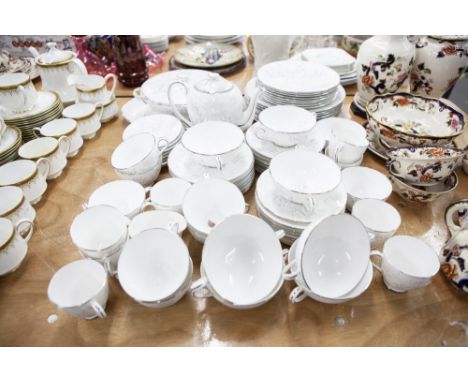 TUSCAN CHINA DINNER, TEA & COFFEE SERVICE with printed pale green foliate spray decoration, for eight persons, approximately 