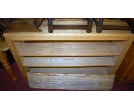 A contemporary light elm freestanding open bookshelf, w.133cm