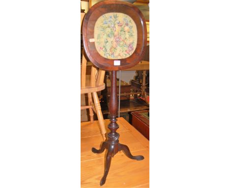 A 19th century mahogany and floral tapestry inset pole screen