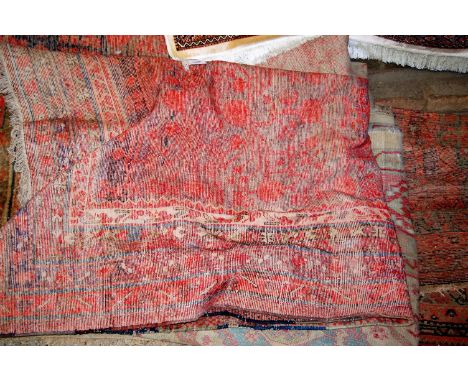 A Turkish woollen carpet, and two Caucasian examples (all heavily worn)Condition Report: The Lighter colour example is A/F, w