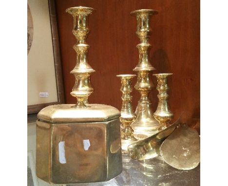 A Pair of 19th Century Brass Candlesticks; with a smaller pair, two shoe horns and a heavy brass lidded caddy. 