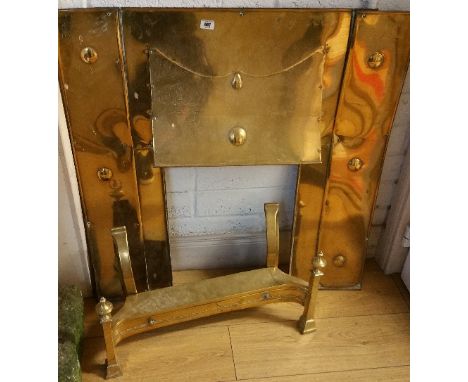 A Polished Steel Brass Fire Surround; with pronounced canopy and associated shaped front.