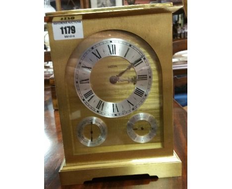 A Vintage Swiss Brass Cased Angelus Combination Clock with barometer and thermometer.
