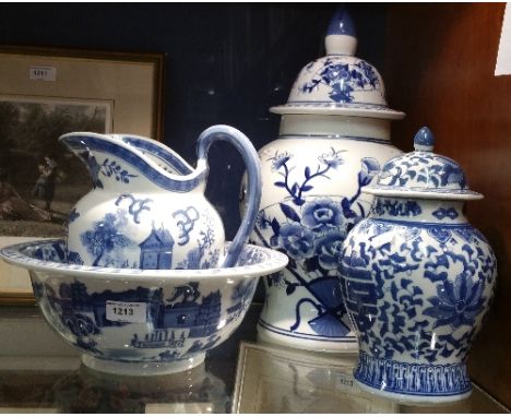 A Chinese Blue & White Baluster Vase & Cover (H 44cm), along with a smaller ditto & a blue & white wash basin and jug.