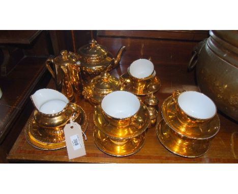 A Quantity of Royal Worcester Teawares; with gold plated decoration.