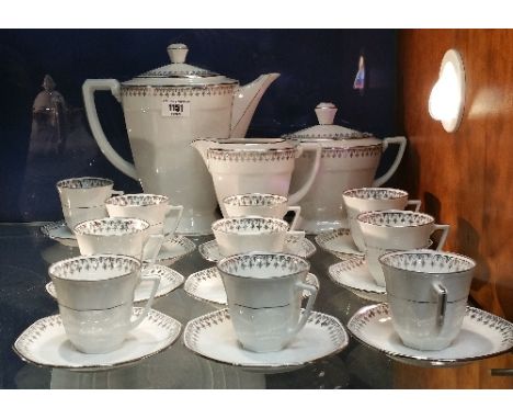 A Quantity of Continental Coffee Wares; with silver coloured border decoration comprising coffee pot, milk jug, covered sugar