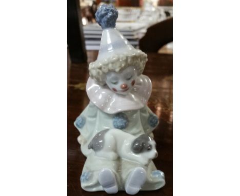 A Lladro Figure of a Child Clown.