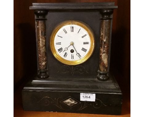 A 19th Century Black Slate & Marble Mantle Clock with turned column supports, enamelled dial.