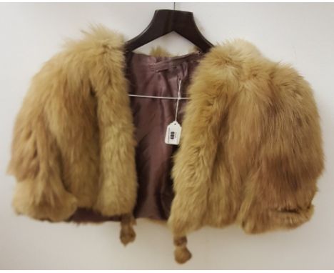 A Light Brown Fur Cape, circa 1940, along with a fur trimmed ladies jacket.