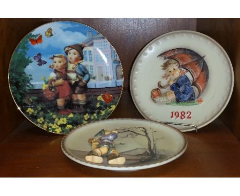 Three Goebel/Hummel Plates: 1995 Plate with a Boy in Relief, numbered Hum 298; 1982 12th Annual Plate & Limited Edition Plate