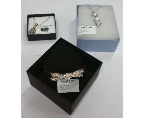 A Silver Coloured Diamante Drop Necklace, A Silver Diamante Bangle Along With A Tear Drop Pendant.