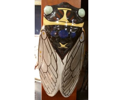 A Ceramic Wall Pocket in the Form of a Winged Insect, Signed Flood.