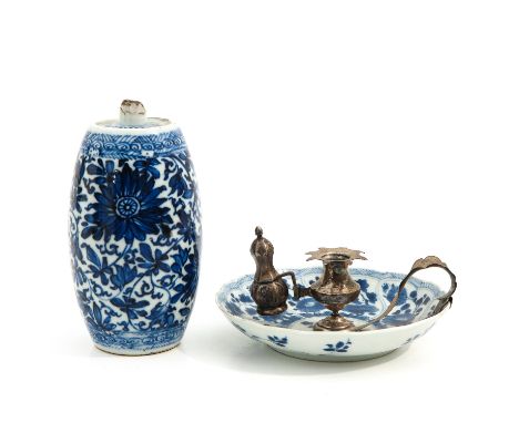 Including candlestick and bottle 14 cm. tall, chip and hairline.