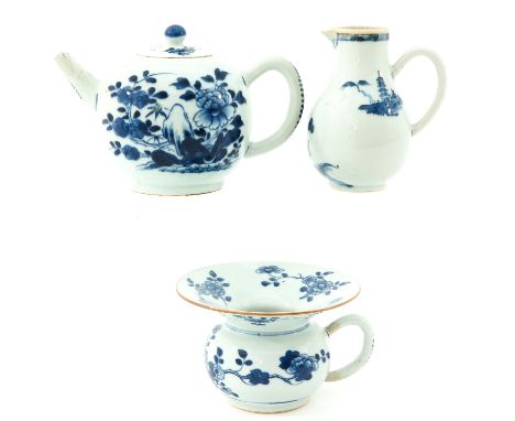 Inlcuding teapot, spitoon, and creamer 12 cm. tall, in diverse conditions.