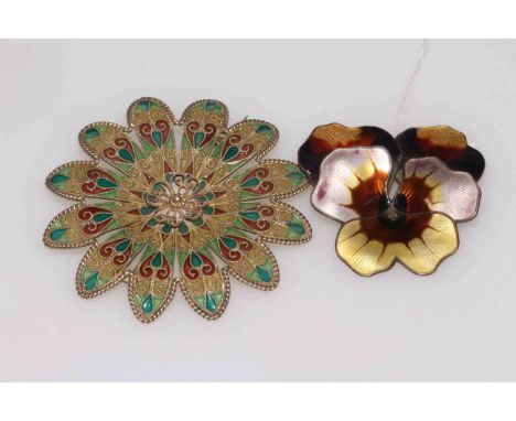 David Anderson, Norway, enamel flower brooch, 5cm across, and filigree silver and enamel brooch, 7cm diameter (2).