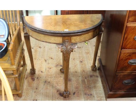 Burr walnut demi lune fold top card table on ball and claw legs, 77cm by 82cm by 41cm (closed).