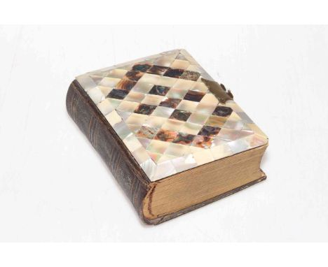 Mother of pearl decorated album of old portrait photographs, 15cm by 13cm.