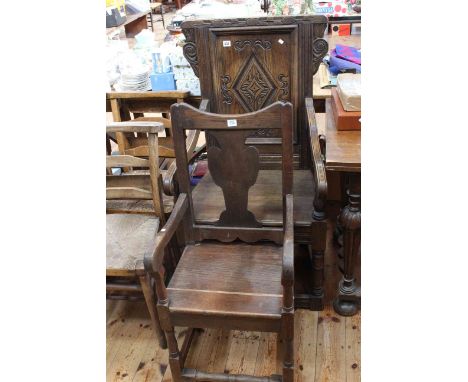 Carved panel back oak elbow chair and jointed oak elbow chair (2).