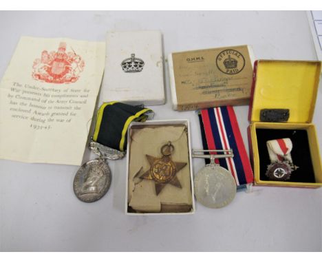 Territorial Army George VI efficient service medal, World War II service medal, 39/45 Star medal, a loose ' mentioned in disp