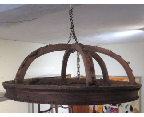 Early 20th Century French carved beechwood circular bed corona (at fault) and a large chandelier ceiling mount on a board 