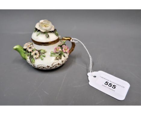 19th Century Rockingham floral encrusted miniature teapot and cover, printed mark in puce, 2.75ins highSmall chip to flowers 