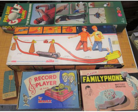 Quantity of boxed children's games including Corgi, Rockets and a Marx record player 
