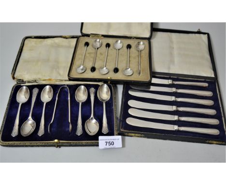 Cased set of six silver teaspoons with sugar tongs together with a cased set of six silver coffee spoons with bean handles (o