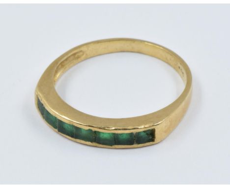 14ct Gold seven stone emerald dress ring 