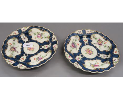 Pair of 18th Century Worcester dishes on blue and white ground, with hand painted floral decoration and gilded highlights, 8.