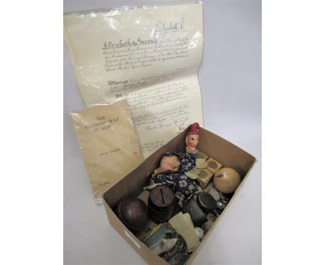 Box containing a miscellaneous quantity of items including a money box, pocket compass, puppets, cricket ball, OBE facsimile 
