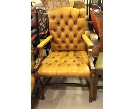 20th Century light tan leather button upholstered open elbow chair on square moulded front supports 