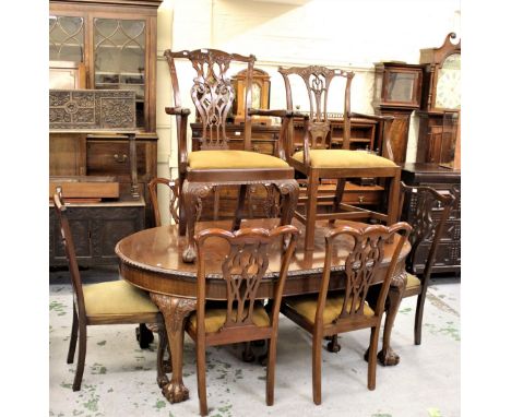 Early 20th Century mahogany dining room suite comprising:  harlequin set of eight carved mahogany Chippendale style dining ch