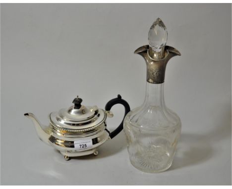 London silver Goldsmiths & Silversmiths Co. teapot with ebonised handle on low bun supports, 14.5ozs and a cut glass Birmingh