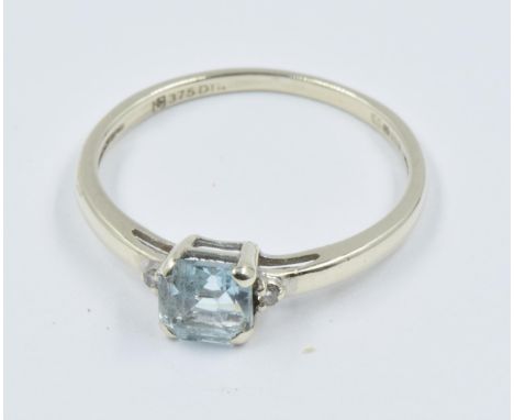 9ct Yellow gold diamond and aquamarine ring 