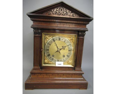 Edwardian walnut cased two train mantel clock of architectural form, the gilt dial with a silvered chapter ring and Roman num