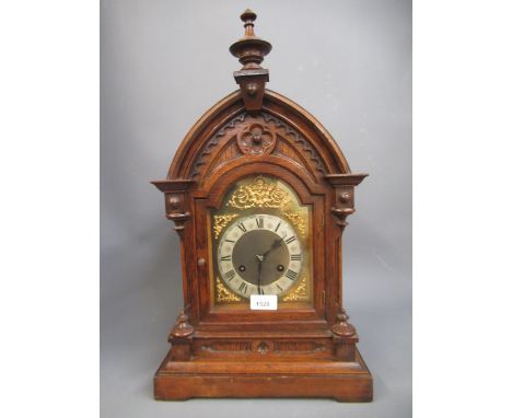 Late 19th / early 20th Century French ormolu mounted walnut mantel clock with a two train movement striking on a bell, 15ins 