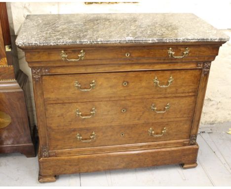 19th Century French walnut commode, the grey flecked marble top above four drawers with ornate cast brass handles, flanked by
