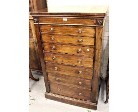 19th Century Wellington type chest of six graduated drawers with brass ring handles, above a plinth base, 50ins x 30ins 