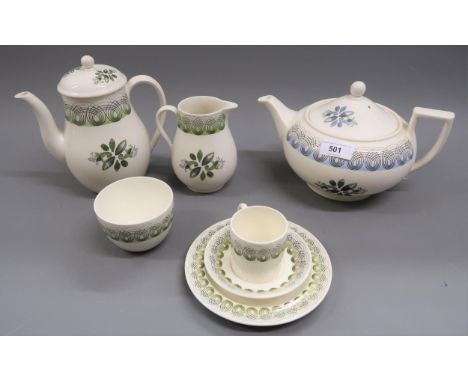 Large Wedgwood teapot, coffee can, coffee pot, milk jug and sugar bowl and a trio in blue and yellow colourways, by Eric Ravi