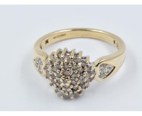 9ct Yellow gold diamond cluster ring with diamond set shouldersSize N 
