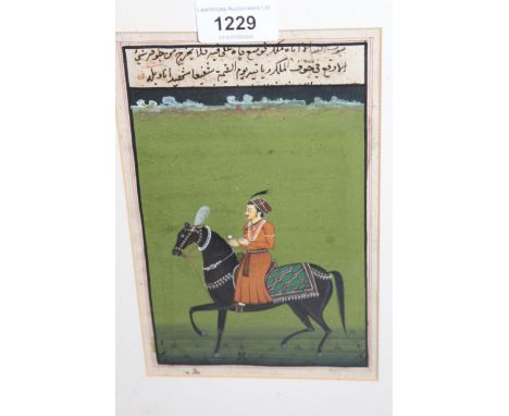 An Indian painting, equestrian portrait of a nobleman riding a black horse, 8ins x 5ins 