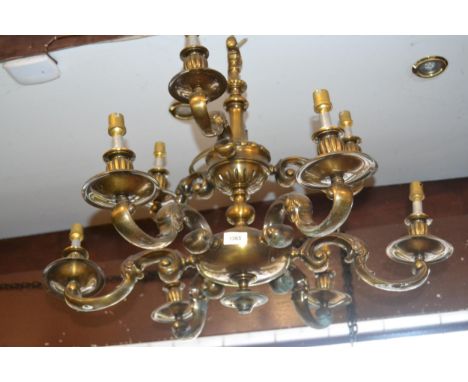 Pair of good quality mid 20th Century bronze two tier nine light electroliers in antique Dutch style, 23ins approximately 